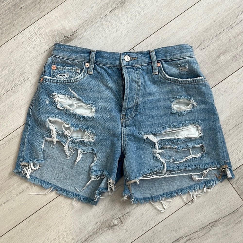 Free people we the free distressed denim shorts size 26